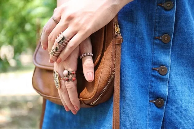 A close-up of a woman's hands showcasing a selection of rings, bracelets, and a stylish clutch, emphasizing the importance of choosing the right accessories.