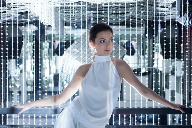 A long shot of a celebrity wearing a 3D-printed dress with integrated LED lights that pulse and change color in response to their movements. The dress appears both futuristic and elegant, highlighting innovation.